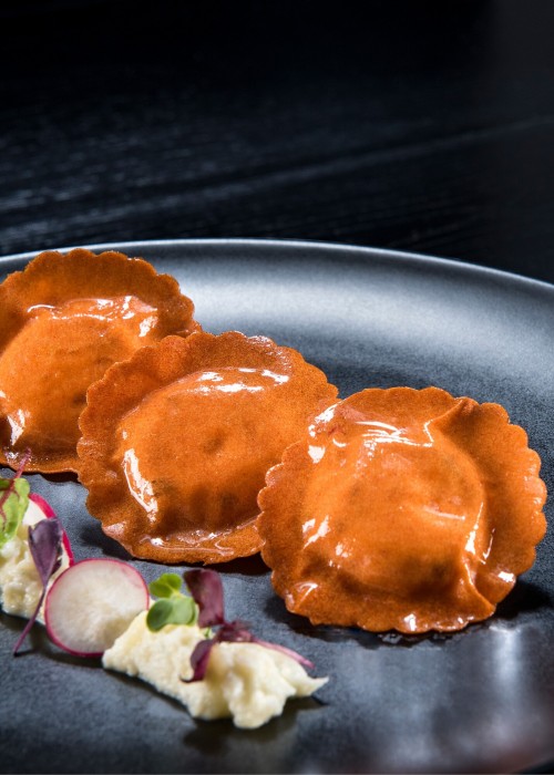 Ravioli met groentevel rode peper